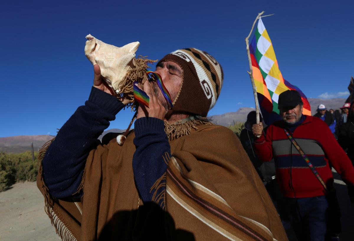 A man plays the Pututu, a wind instrument, during a ceremony following the return of the so-called “Child of Chani,” an Inca-era child mummy found frozen in 1905 at nearly 5,900 meters on a mountain, after being returned to a local indigenous community following about 120 years in a Buenos Aires museum, El Moreno, in Jujuy province, Argentina May 28, 2026. REUTERS/Gianni Bulacio