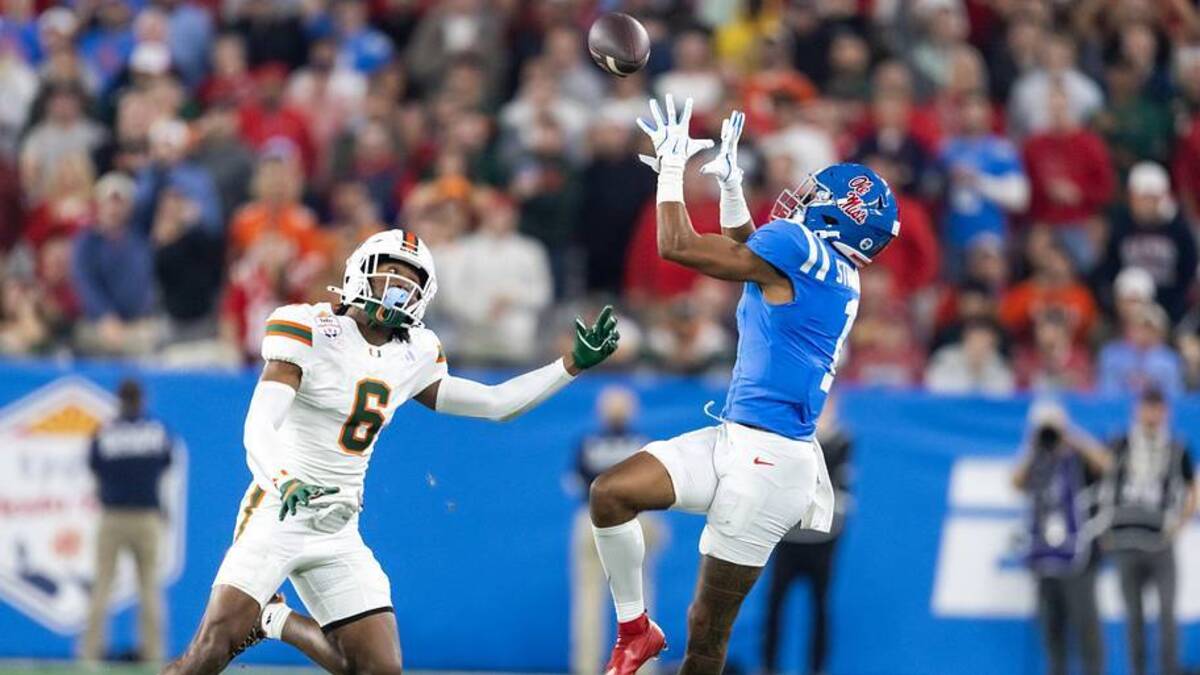  Jan 8, 2026; Glendale, AZ, USA; Mississippi Rebels wide receiver De'Zhaun Stribling (1) against Miami Hurricanes defensive back Xavier Lucas (6) during the 2026 Fiesta Bowl and semifinal game of the College Football Playoff at State Farm Stadium. Mandatory Credit: Mark J. Rebilas-Imagn Images | Mark J. Rebilas-Imagn Images 