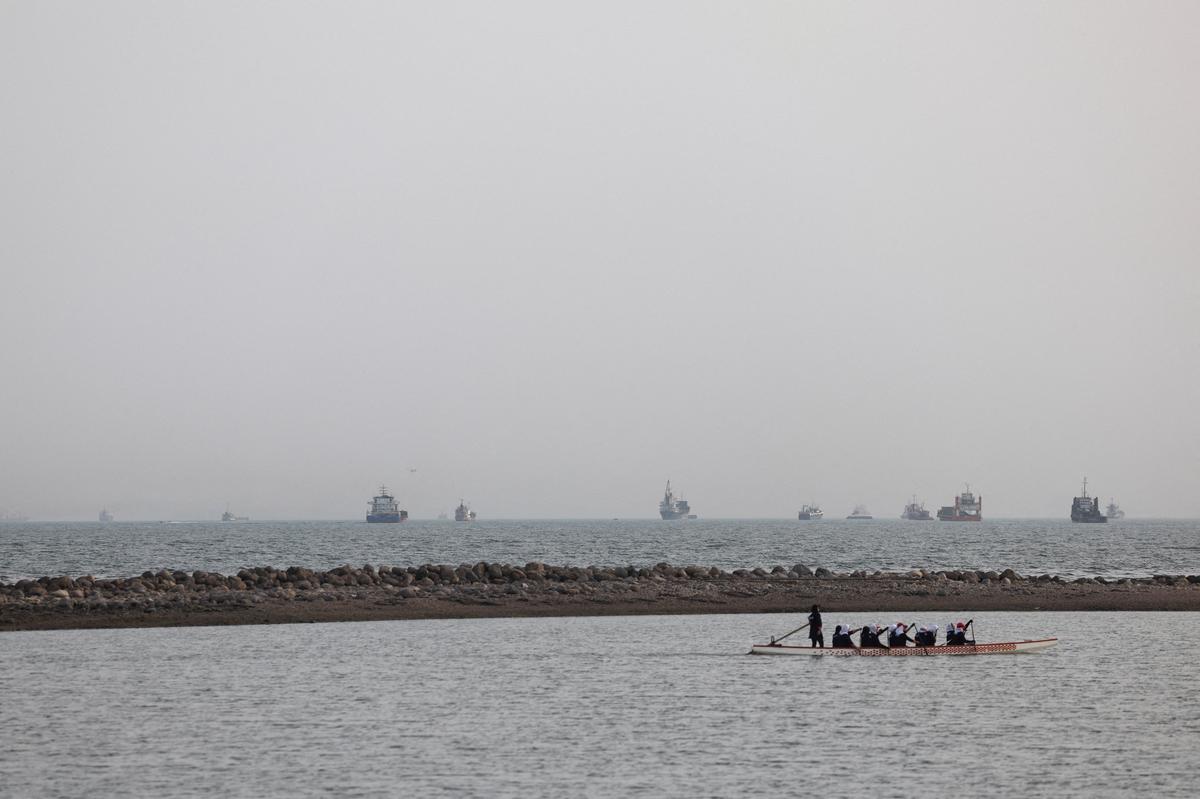 Vessels in the Strait of Hormuz are visible near the beach of Bandar Abbas, Iran, May 22, 2026. Majid Asgaripour/WANA (West Asia News Agency) via REUTERS