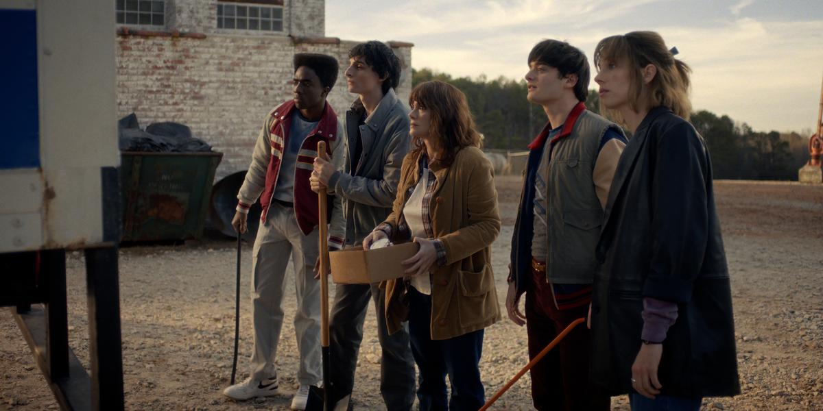 (Left to right) Caleb McLaughlin as Lucas Sinclair, Finn Wolfhard as Mike Wheeler, Winona Ryder as Joyce Byers, Noah Schnapp as Will Byers and Maya Hawke as Robin Buckley in Stranger Things: Season 5. COURTESY OF NETFLIX © 2025