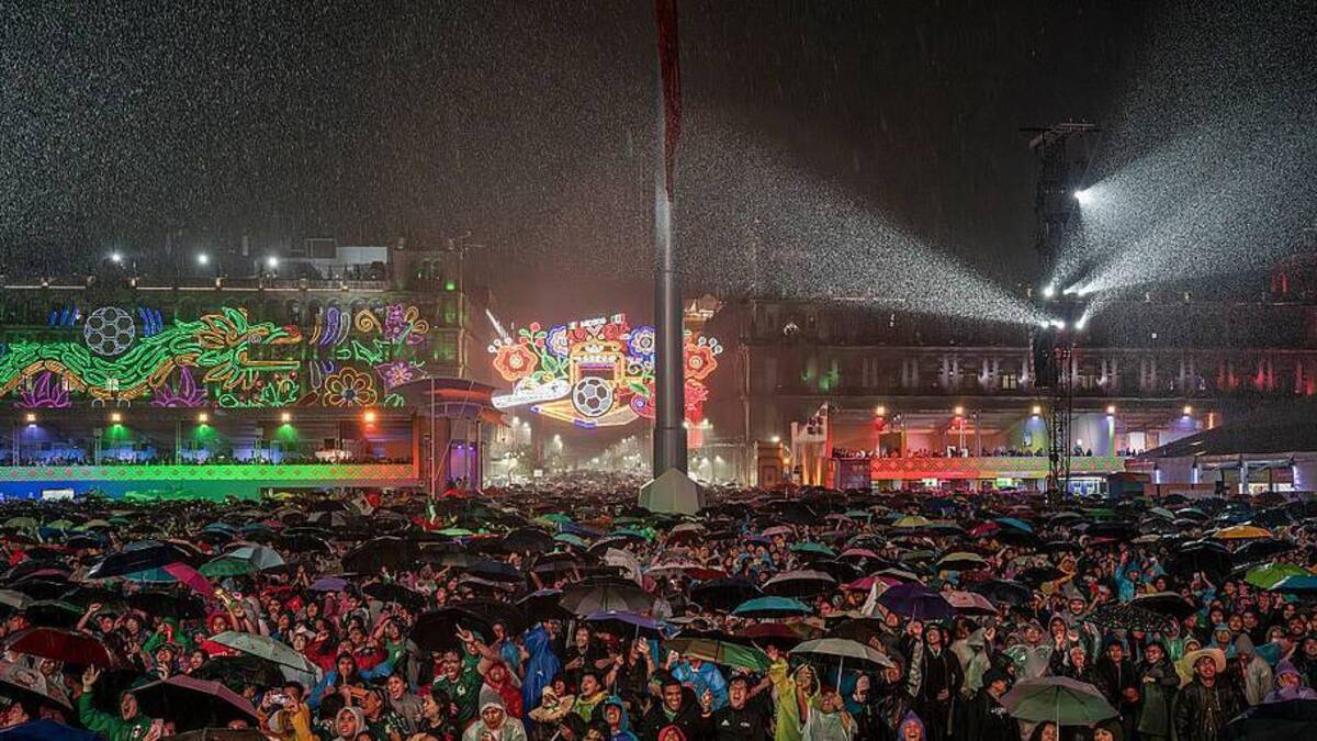  Not even heavy rainfall can dissuade Mexican fans from attending official FIFA Fan Fests across the country. | Cristopher Rogel Blanquet/FIFA/Getty Images 