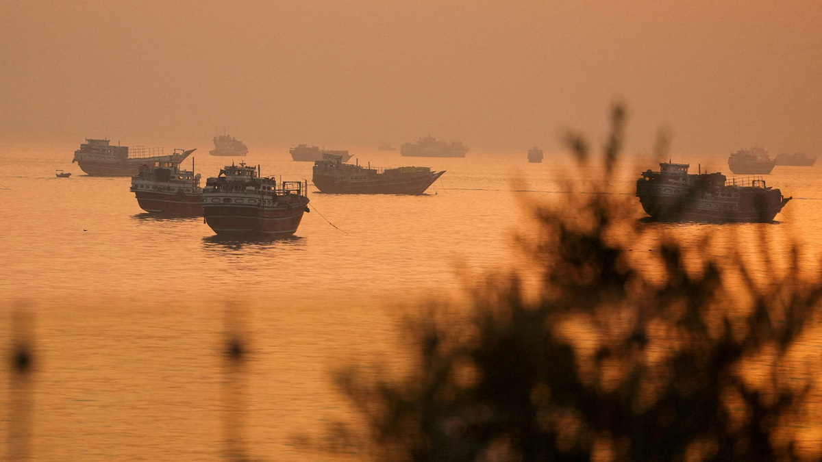 FILE PHOTO: Vessels at the Strait of Hormuz, as seen from Musandam, Oman, June 16, 2026. REUTERS/Stringer/File Photo