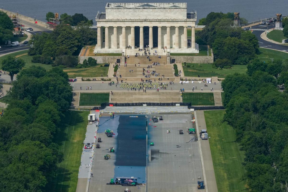 A general view from the Washington Monument of the Lincoln Memorial as workers continue renovations on the Reflecting Pool, which is painted blue, in Washington, D.C., U.S., May 2, 2026. REUTERS/Ken Cedeno