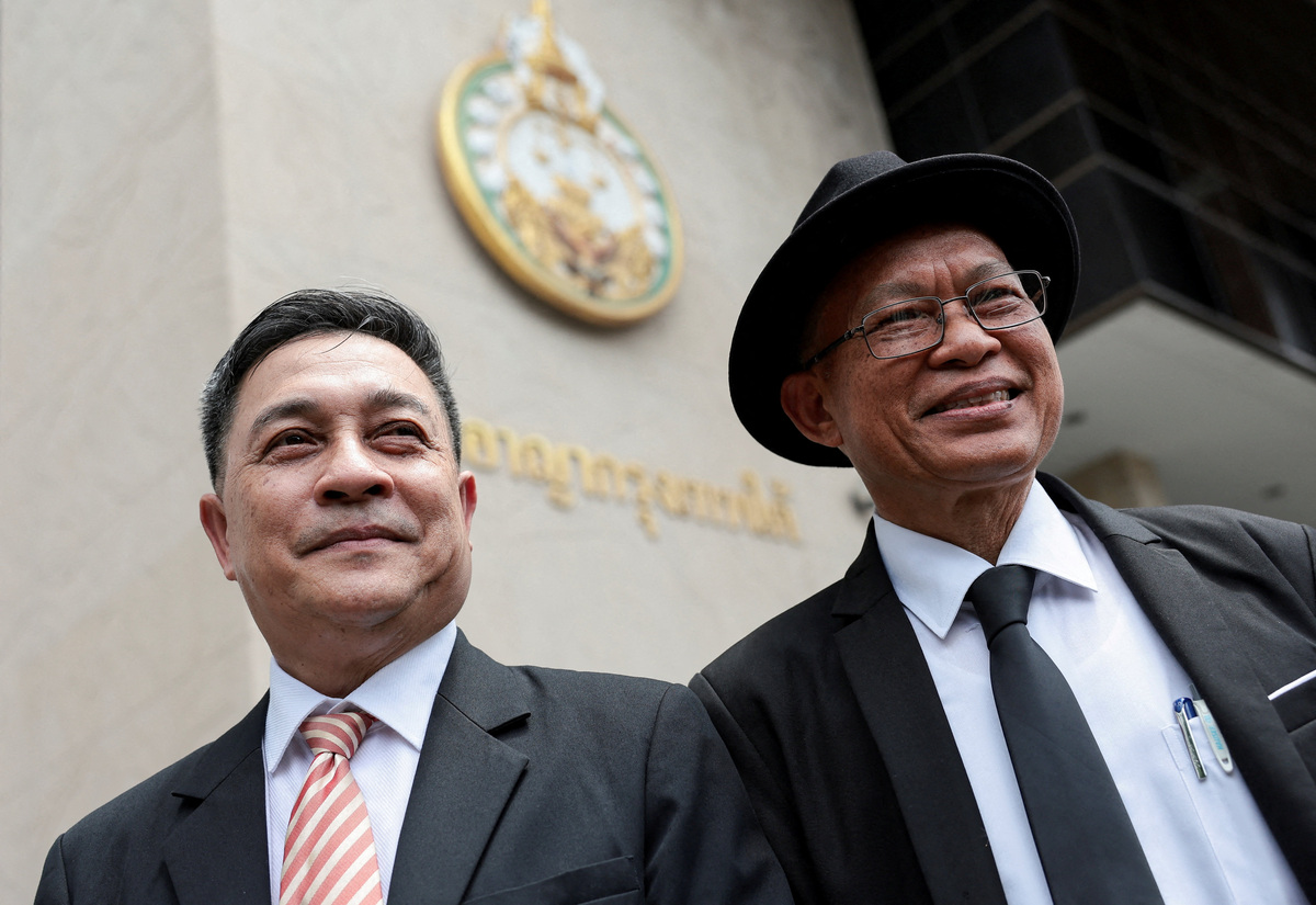 Choochat Kanpai and Chamroen Panompakakorn, laywers of Bilal Mohammed and Yusufu Mieraili, react after a Thai criminal court found Yusufu Mieraili and Bilal Mohammed, also known as Adem Karadag, guilty and sentenced them to death over the August 17, 2015, Bangkok blast that killed 20 people, at South Bangkok Criminal Court, in Bangkok, Thailand, June 11, 2026. REUTERS/Chalinee Thirasupa