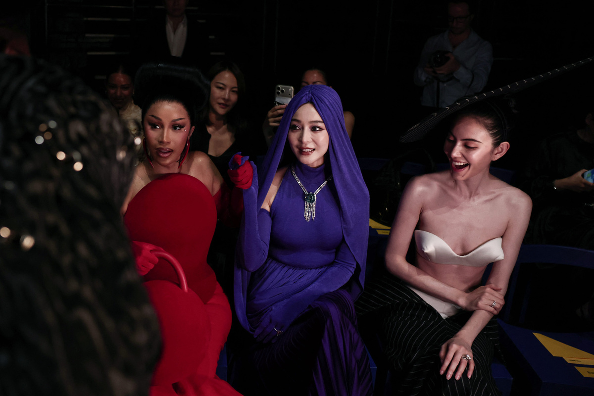 US rapper Cardi B (L) and Chinese actress Fan Bingbing (C) attend the Robert Wun Women Haute Couture fall/winter 2026-2027 collection as part of the Paris Fashion Week, in Paris, on July 8, 2026. usa