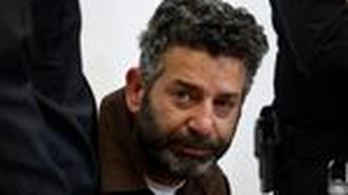 FILE PHOTO: Activist Saif Abu Keshek, a Spanish national, who was detained aboard the Gaza-bound Global Sumud Flotilla, which was intercepted by Israeli forces in international waters, appears at a court in Beersheba, southern Israel May 6, 2026. REUTERS/Amir Cohen/File Photo