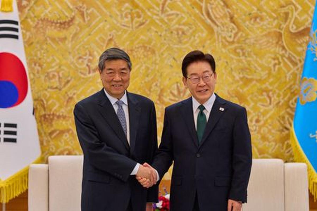 South Korean President Lee Jae Myung shakes hands with Chinese Vice Premier He Lifeng during their meeting at the Presidential Blue House in Seoul, South Korea, May 13, 2026.    The Presidential Blue House/Yonhap via REUTERS