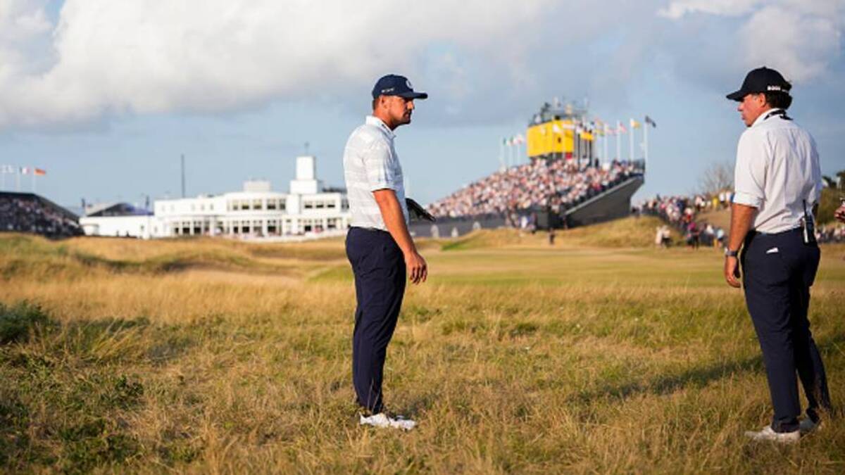  Bryson DeChambeau chatted briefly with a rules official on the 18th hole. | Tracy Wilcox/Getty Images 