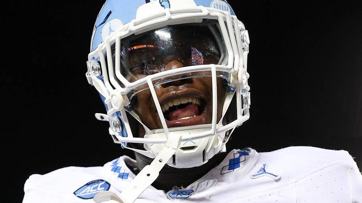  Aug 29, 2024; Minneapolis, Minnesota, USA; North Carolina Tar Heels defensive lineman Travis Shaw (4) celebrate his teams win against the Minnesota Golden Gophers after the game at Huntington Bank Stadium. Mandatory Credit: Matt Krohn-Imagn Images | Matt Krohn-Imagn Images 