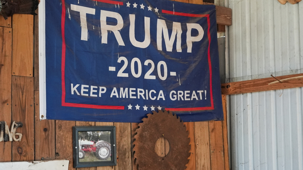 A Trump 2020 flag hangs from a wall inside the barn of Republican farmer Don Westlake in Cedartown, Georgia, U.S.,. February 9, 2026. REUTERS/Jayla Whitfield-Anderson