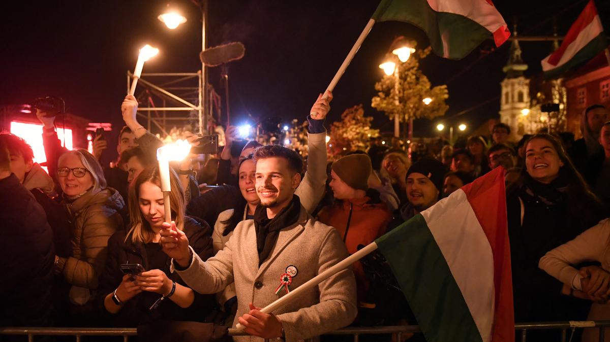 Supporters of the pro-European conservative TISZA party celebrate in Budapest after the general election in Hungary, on April 12, 2026. The party of conservative Peter Magyar won a two-thirds parliamentary majority in Sunday's Hungarian elections in a clear defeat for nationalist long-time Prime Minister Viktor Orban, according to near-complete results. (Ferenc Isza/AFP/Getty Images/TNS)
