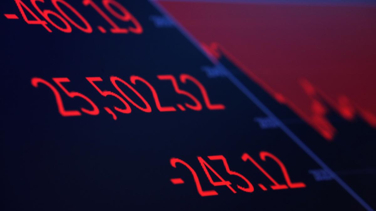 A screen displays the Dow Jones Industrial Average after the closing bell on the floor of the New York Stock Exchange (NYSE) in New York, U.S., March 20, 2019. REUTERS/Brendan McDermid