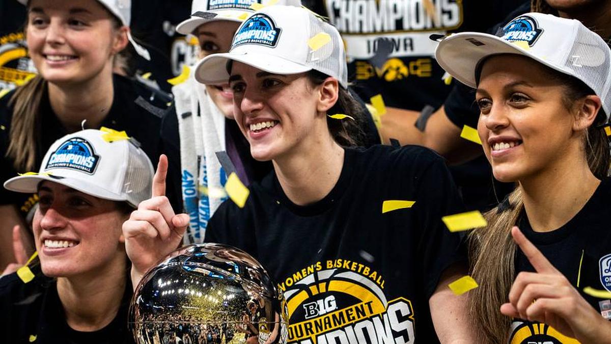  Iowa guard Kate Martin (20), Iowa guard Caitlin Clark (22) and Iowa guard Gabbie Marshall (24) pose for a photo after the Big Ten Tournament championship game at the Target Center on Sunday, March 10, 2024, in Minneapolis, Minn. | Lily Smith/The Register / USA TODAY NETWORK 