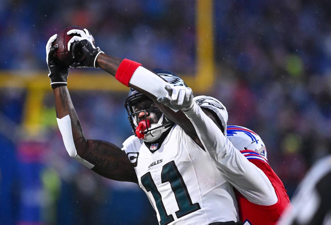  Philadelphia Eagles wide receiver A.J. Brown (11) catches a pass against the Buffalo Bills in the first quarter at Highmark Stadium. Mark Konezny-Imagn Images
