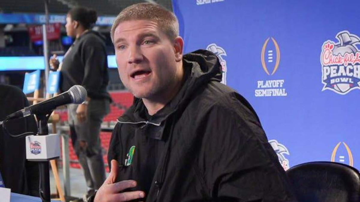  Oregon defensive coordinator Tosh Lupoi speaks during a media day as the Oregon Ducks arrive on Jan. 7, 2025, in Atlanta, Georgia ahead of the Peach Bowl at Mercedes-Benz Stadium. | Ben Lonergan/The Register-Guard / USA TODAY NETWORK via Imagn Images 