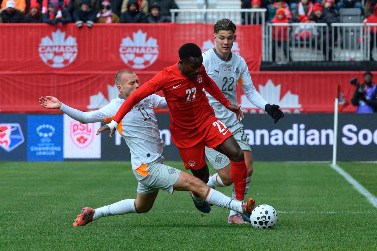  Richie Laryea and Brynjolfur Willumsson compete for possession during the Canada v. Iceland International friendly at BMO Field. Photo by Anatoliy Cherkasov/Informa Plus Photo Agency/LightRocket via Getty Images