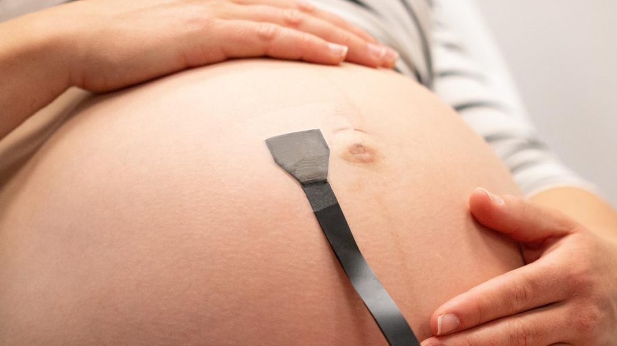 A new wearable ultrasound patch could provide continuous monitoring of the fetus and umbilical cord during pregnancy. (Geonho (Tom) Park via SWNS). 