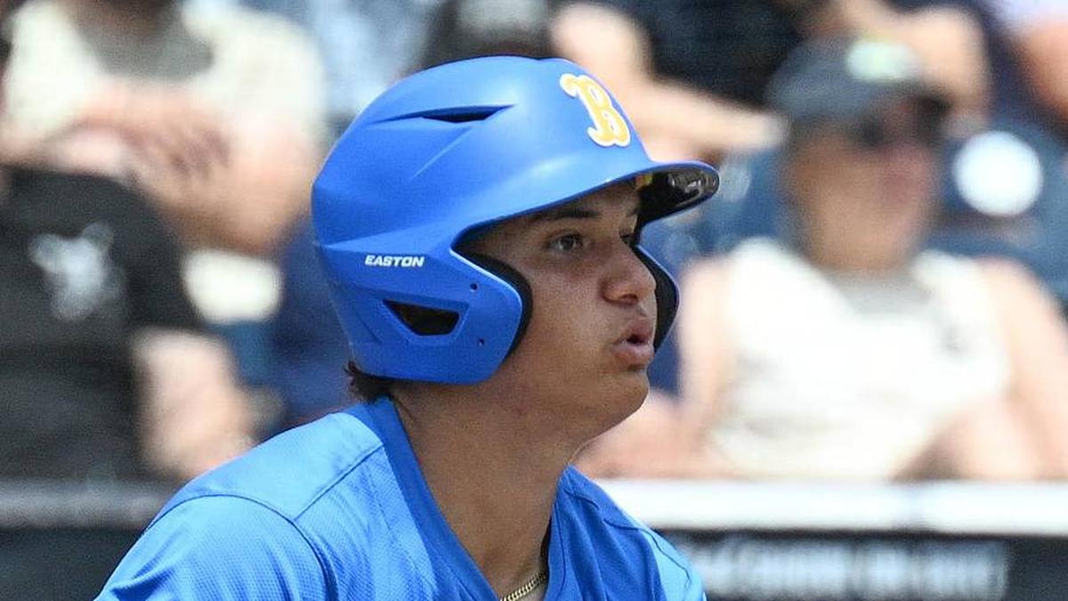  Jun 14, 2025; Omaha, Neb, USA; UCLA Bruins first baseman Mulivai Levu (39) singles against the Murray State Racers during the first inning at Charles Schwab Field. Mandatory Credit: Steven Branscombe-Imagn Images | Steven Branscombe-Imagn Images 