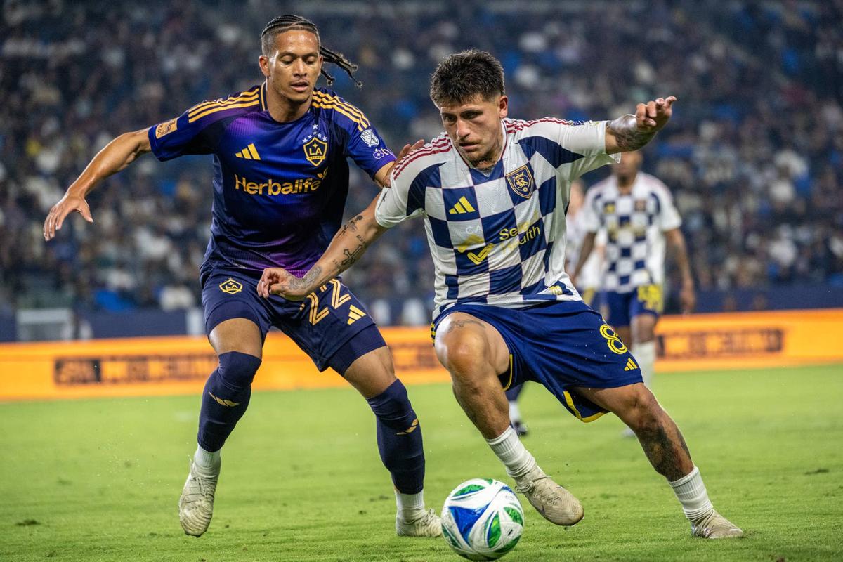  Diego Luna #8 of Real Salt Lake battles Elijah Wynder #22 of Los Angeles Galaxy during the second half of the match at Dignity Health Sports Park on May 31, 2025 in Carson, California. The Los Angeles Galaxy won the match 2-0 (Photo by Shaun Clark/Getty Images) Photo by Shaun Clark/Getty Images