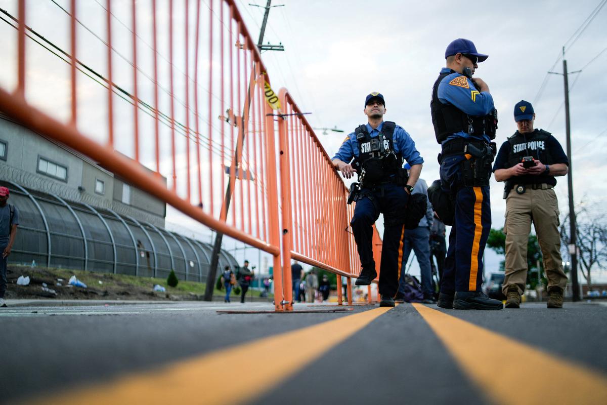 New Jersey State Policemen set up a protest zone outside the Delaney Hall detention center, as demonstrators remain gathered outside, in Newark, New Jersey, U.S., May 29, 2026. REUTERS/Eduardo Munoz