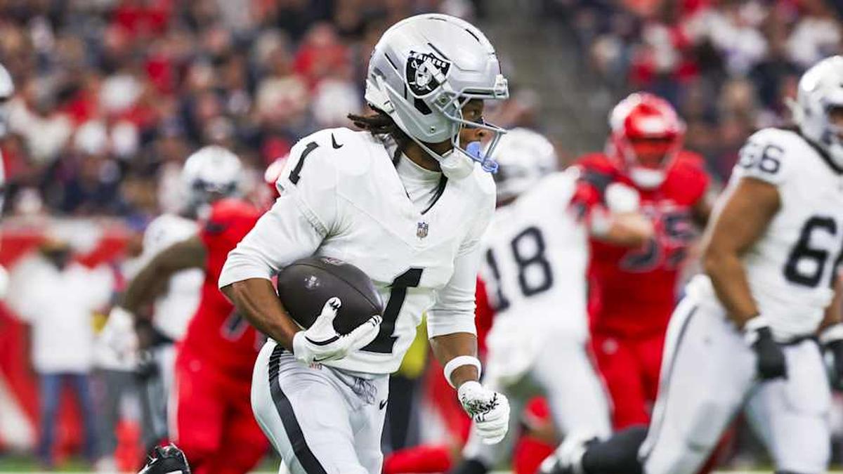  Dec 21, 2025; Houston, Texas, USA; Las Vegas Raiders wide receiver Tre Tucker (1) rushes on a sweep play against the Houston Texans during the first quarter at NRG Stadium. Mandatory Credit: Thomas Shea-Imagn Images | Thomas Shea-Imagn Images 
