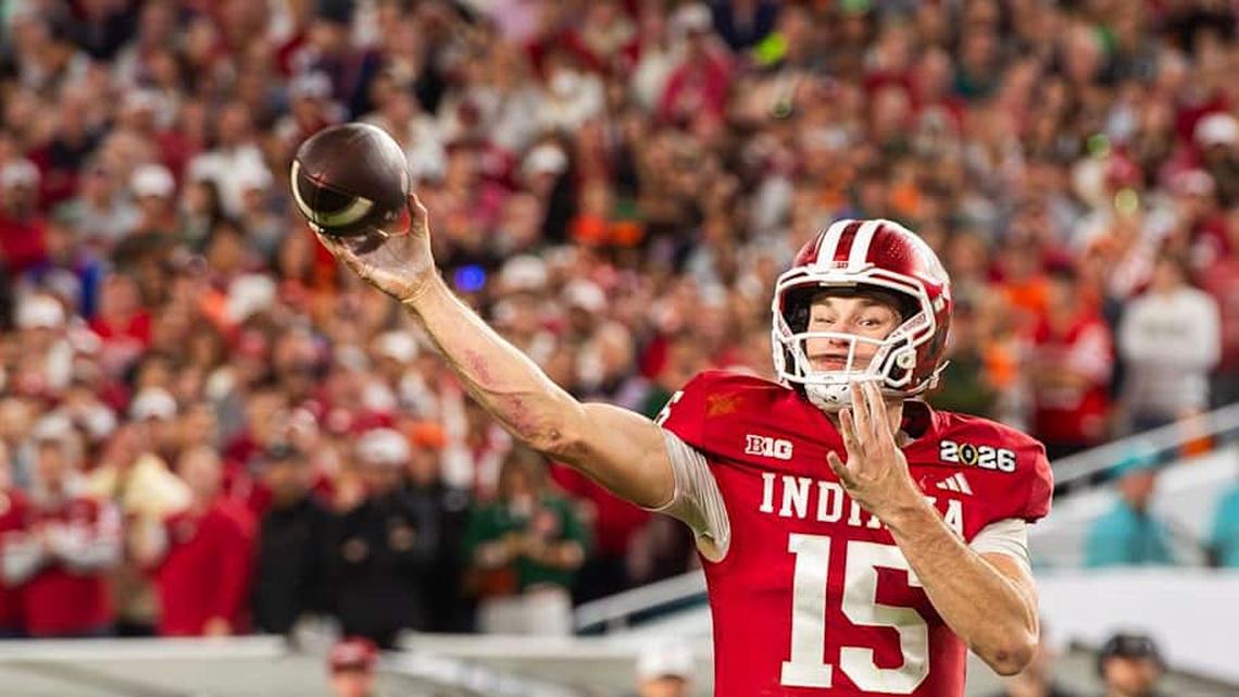  Indiana's Fernando Mendoza (15) passes to Charlie Becker (80) during the College Football Playoff National Championship college football game at Hard Rock Stadium in Miami Gardens on Monday, Jan. 19, 2026. | Rich Janzaruk/Herald-Times / USA TODAY NETWORK via Imagn Images 