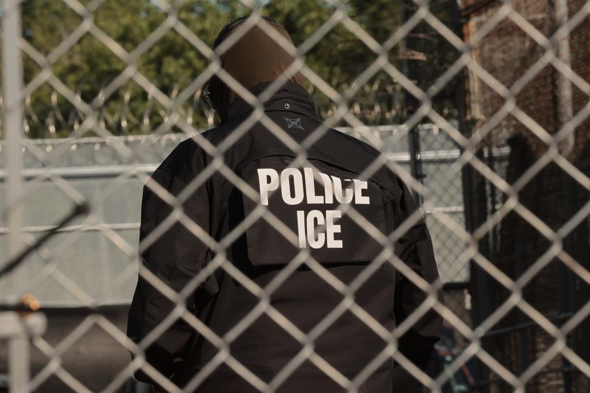  An Immigration and Customs Enforcement agent stands guard ahead of Newark Mayor Ras Baraka’s press conference in front of Delaney Hall on June 2, 2026, in Newark, New Jersey. (Michael M. Santiago/Getty Images) 