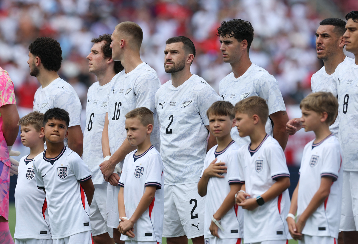 Soccer Football - International Friendly - England v New Zealand - Raymond James Stadium, Tampa, Florida, U.S. - June 6, 2026 New Zealand's Tim Payne and teammates line up during the national anthems before the match IMAGN IMAGES via Reuters/Nathan Ray Seebeck