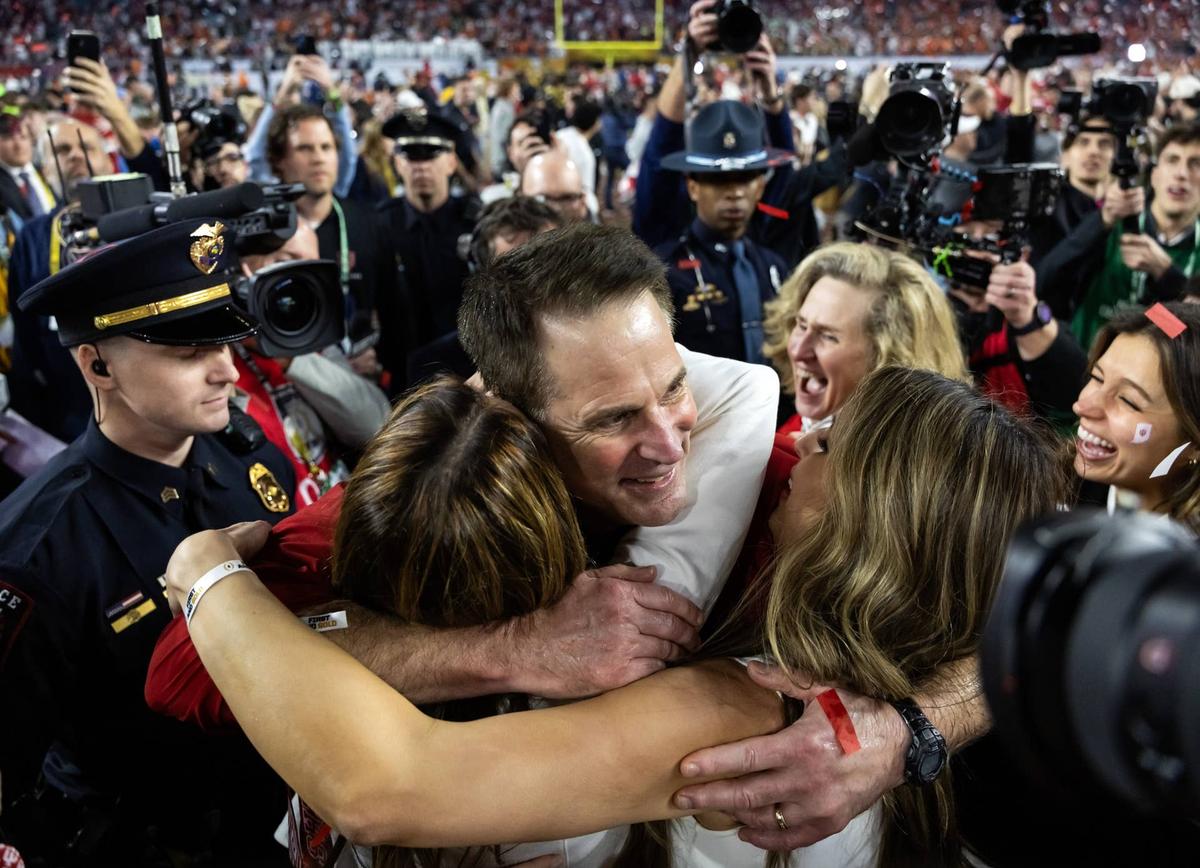  Indiana Hoosiers head coach Curt Cignetti celebrates with his family after his team defeated the Miami Hurricanes in the College Football Playoff National Championship Game at Hard Rock Stadium on Jan. 19, 2026. Mark J. Rebilas-Imagn Images