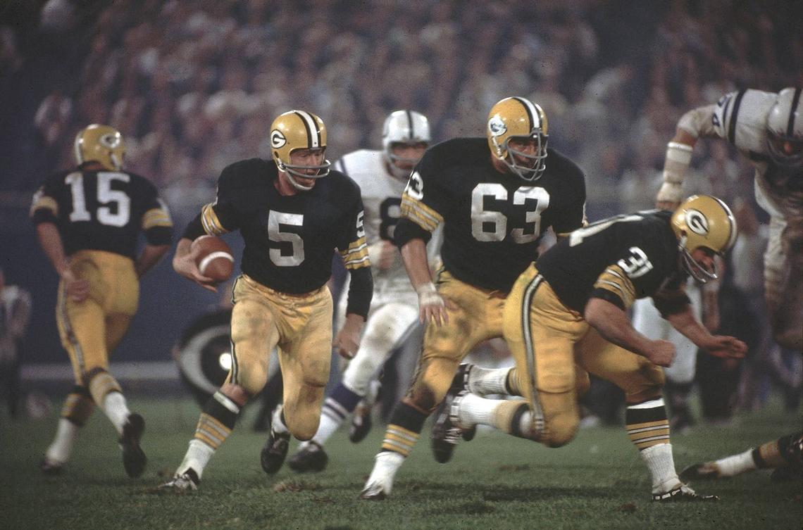  Green Bay Packers running back Paul Hornung (5) in action, rushing behind Jim Taylor (31) and Fuzzy Thurston (63) vs. the Baltimore Colts at Lambeau Field. Walter Iooss Jr. /Sports Illustrated via Getty Images