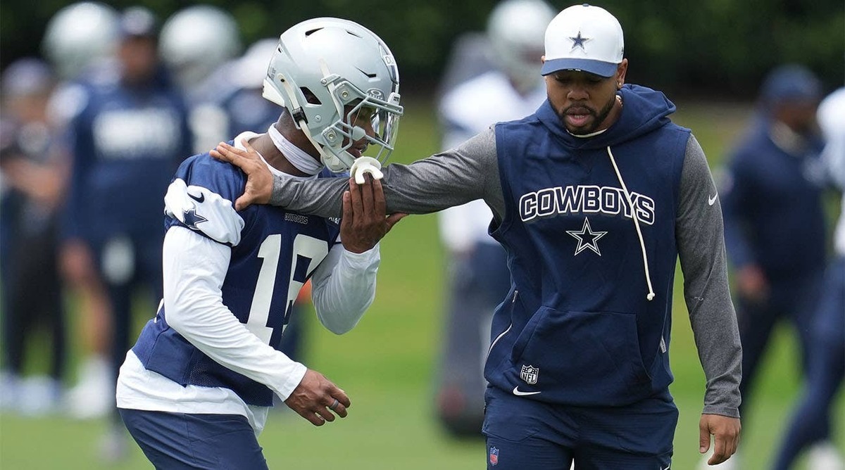  Dallas Cowboys safety Caleb Downs is coached through a drill with defensive coordinator Christian Parker at the Ford Center at the Star Training Facility in Frisco, Texas. Chris Jones-Imagn Images