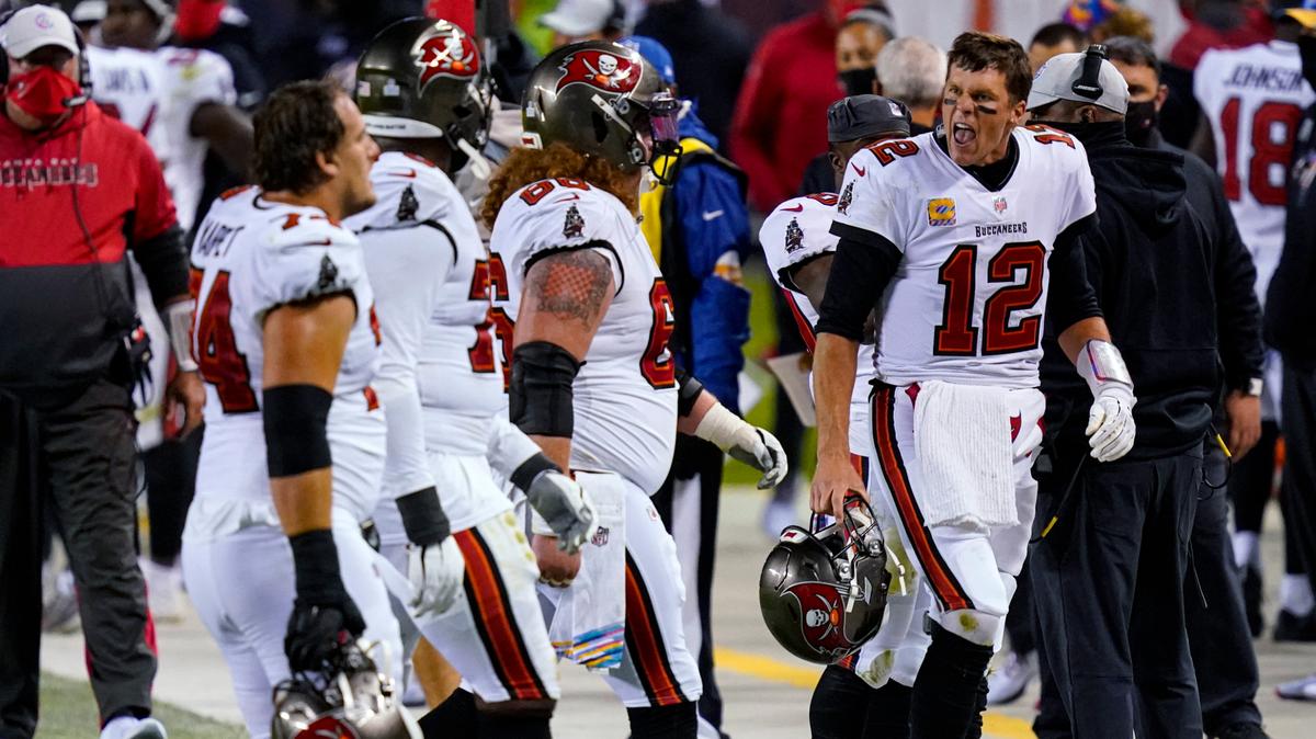 Tampa Bay Buccaneers quarterback Tom Brady (12) yells at members of his offensive line as they walk off the field during the second half of an NFL football game against the Chicago Bears in Chicago, Thursday, Oct. 8, 2020. (AP Photo/Charles Rex Arbogast)