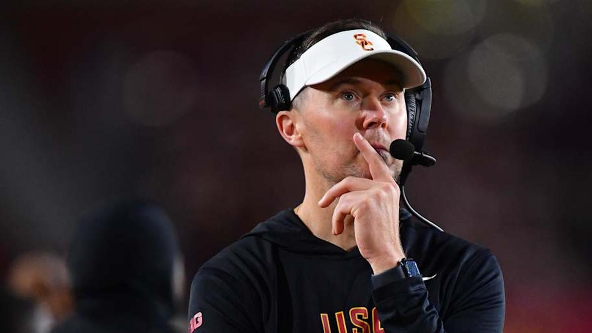  Nov 7, 2025; Los Angeles, California, USA; Southern California Trojans head coach Lincoln Riley watches game action against the Northwestern Wildcats during the second half at the Los Angeles Memorial Coliseum. Mandatory Credit: Gary A. Vasquez-Imagn Images | Gary A. Vasquez-Imagn Images 