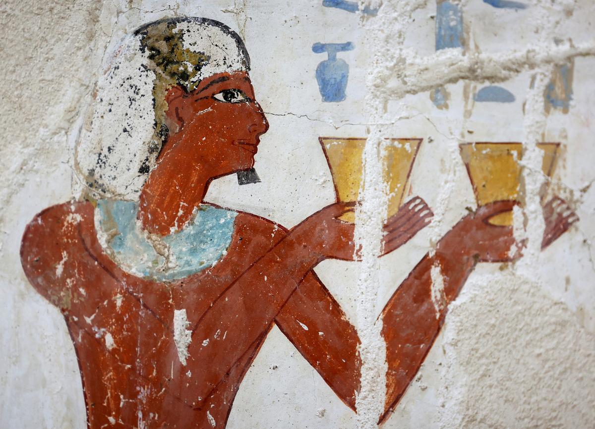 Ancient Egyptian paintings are visible on the newly restored tomb wall, inside the recently restored ancient "Samut" (TT417) in the El-Khokha necropolis on the west bank of the Nile in Luxor, where Egyptian authorities have announced the completion of restoration work on two 18th Dynasty tombs belonging to Amenhotep Rabuia and his son Samut, dating back to the reigns of Pharaohs Thutmose III and Thutmose IV, that contain scenes illustrating daily life, funerary practices, and religious imagery from ancient Egypt, in Egypt, May 14, 2026. REUTERS/Mohamed Abd El Ghany