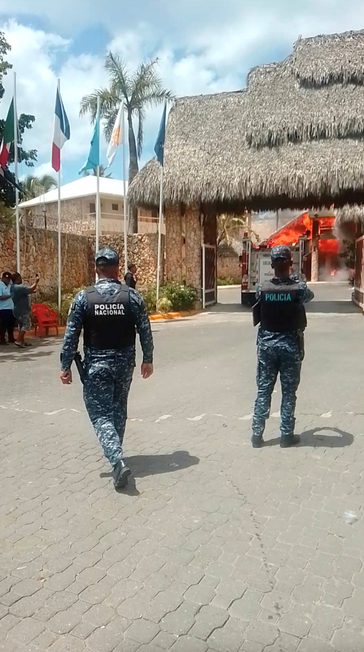 Police officers operate following a fire at a Viva Dominicus resort in Bayahibe, La Altagracia, Dominican Republic, June 19, 2026, in this still taken from a social media video. Junito Mieses/via REUTERS