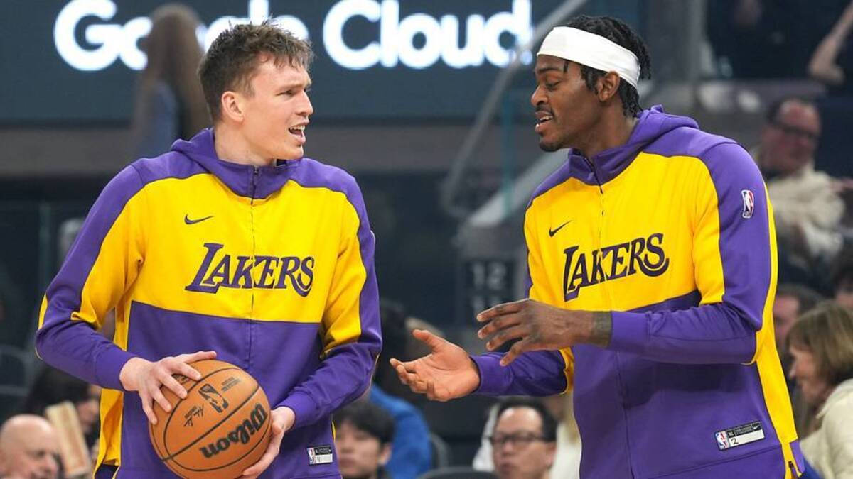  Jan 25, 2025; San Francisco, California, USA; Los Angeles Lakers guard Dalton Knecht (left) and forward Jarred Vanderbilt (right) talk before the game against the Golden State Warriors at Chase Center. Mandatory Credit: Darren Yamashita-Imagn Images | USA TODAY Sports via Reuters Connect 