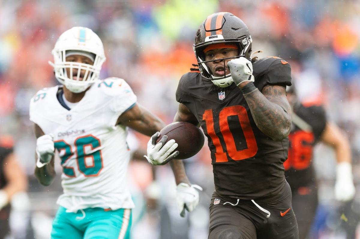 NFL: Miami Dolphins at Cleveland Browns. Oct 19, 2025; Cleveland, Ohio, USA; Cleveland Browns running back Quinshon Judkins (10) runs the ball for a touchdown against Miami Dolphins cornerback Rasul Douglas (26) during the second quarter at Huntington Bank Field. Mandatory Credit: Scott Galvin-Imagn Images