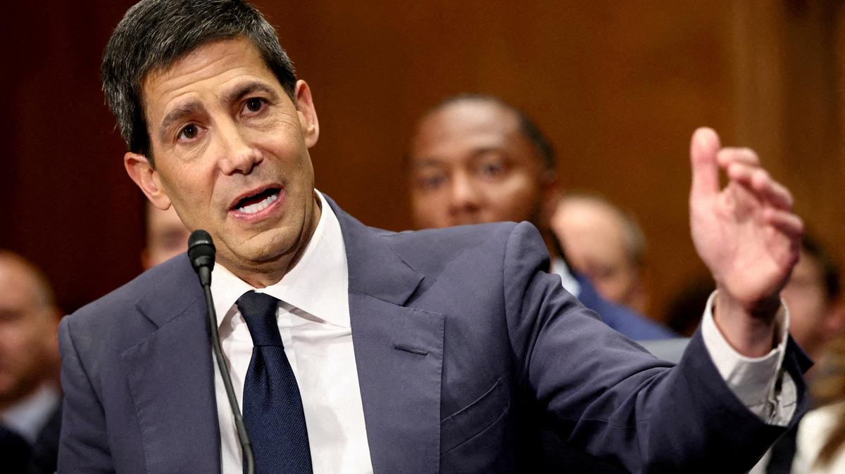 FILE PHOTO: Kevin Warsh, soon to be sworn in as chair of the Federal Reserve, testifies before a Senate Banking Committee confirmation hearing on Capitol Hill in Washington, D.C., U.S., April 21, 2026. REUTERS/Kevin Lamarque/File Photo/File Photo