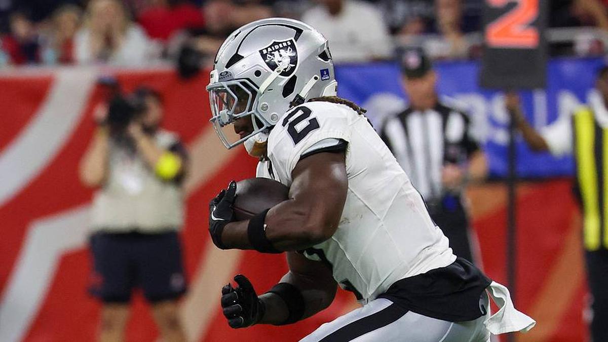  Dec 21, 2025; Houston, Texas, USA; Las Vegas Raiders running back Ashton Jeanty (2) rushes against the Houston Texans in the second half at NRG Stadium. Mandatory Credit: Thomas Shea-Imagn Images | Thomas Shea-Imagn Images 