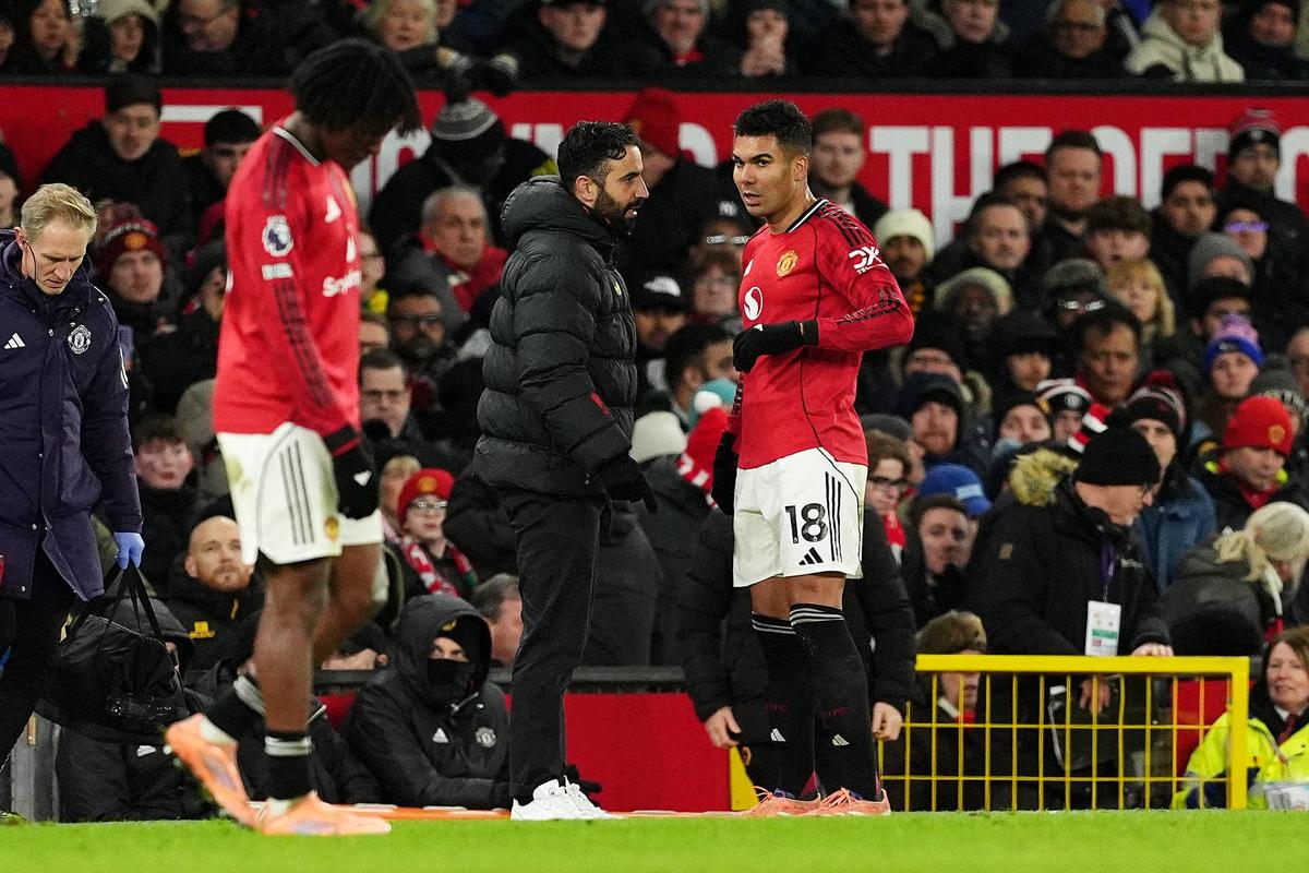  Ruben Amorim speaks to Manchester United's Casemiro on the touchline during a Premier League match at Old Trafford. Photo by Martin Rickett/PA Images via Getty Images