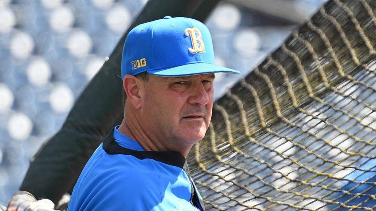  Jun 14, 2025; Omaha, Neb, USA; UCLA Bruins head coach John Savage watches the team warm up before the game against the Murray State Races at Charles Schwab Field. Mandatory Credit: Steven Branscombe-Imagn Images | Steven Branscombe-Imagn Images 