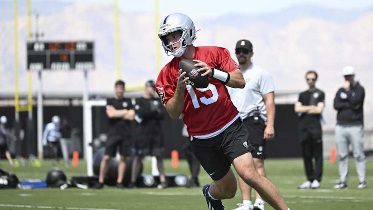  May 2, 2026; Henderson, NV, USA; Las Vegas Raiders quarterback Fernando Mendoza (15) runs through a drill during a Rookie Minicamp at Intermountain Health Performance Center. Mandatory Credit: Candice Ward-Imagn Images | Candice Ward-Imagn Images 