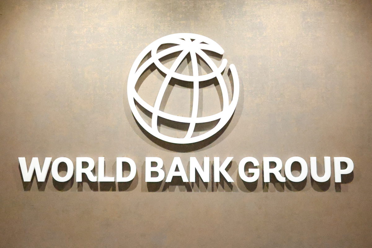 FILE PHOTO: The World Bank Group logo is displayed on a office wall at the International Finance Corporation in Karachi, Pakistan February 4, 2026. REUTERS/Akhtar Soomro/File Photo