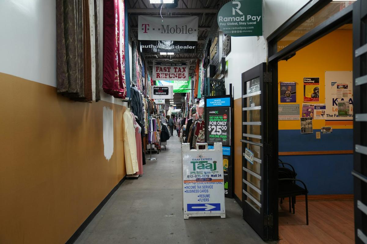  In areas with heavy ICE enforcement, economic activity and foot traffic have fallen. AP Photo/Abbie Parr 