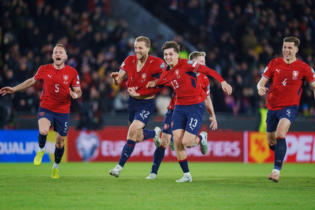 Czech Republic's Vladimir Coufal, Ladislav Krejci, Tomas Soucek, and Robin Hranac celebrate after their World Cup qualification football match victory against Denmark. Photo by Liselotte Sabroe / Ritzau Scanpix / AFP via Getty Images