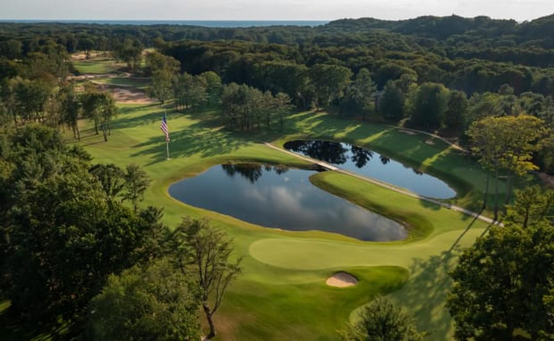 At 1 p.m. each day, play halts so that staff and players can face the American flag, stand at attention and listen to ‘Taps.’