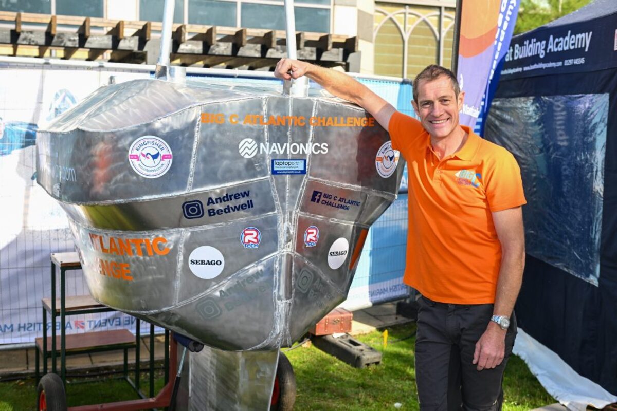  Andrew Bedwell and his boat "Big C V2." (Paul Larkin via SWNS) 