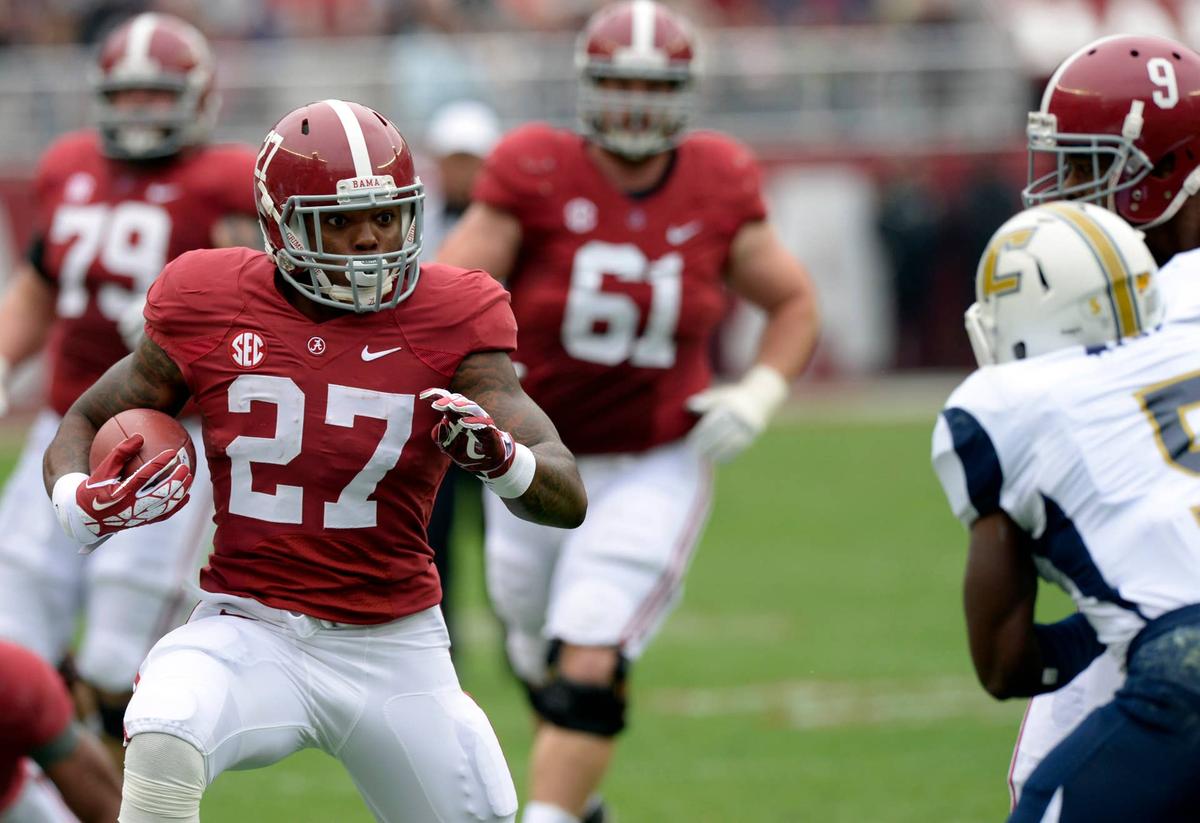  Alabama Crimson Tide running back Derrick Henry carries the ball up the field against the Chattanooga Mocs at Bryant-Denny Stadium. John David Mercer-USA TODAY Sports