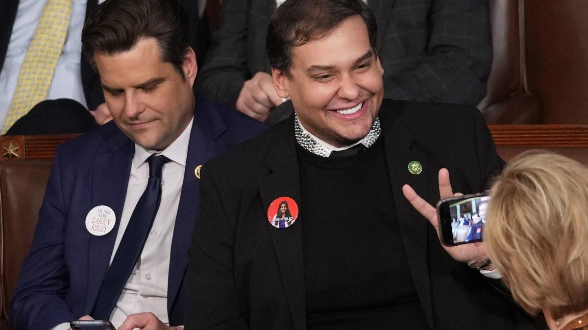 Expelled former Rep. George Santos, R-N.Y., smiles for a photo as he sits with Rep. Matt Gaetz, R-Fla., as they wait for the annual State of the Union speech in 2024. Santos is now being accused of betting against himself on prediction market Kalshi. File Photo by Pat Benic/UPI