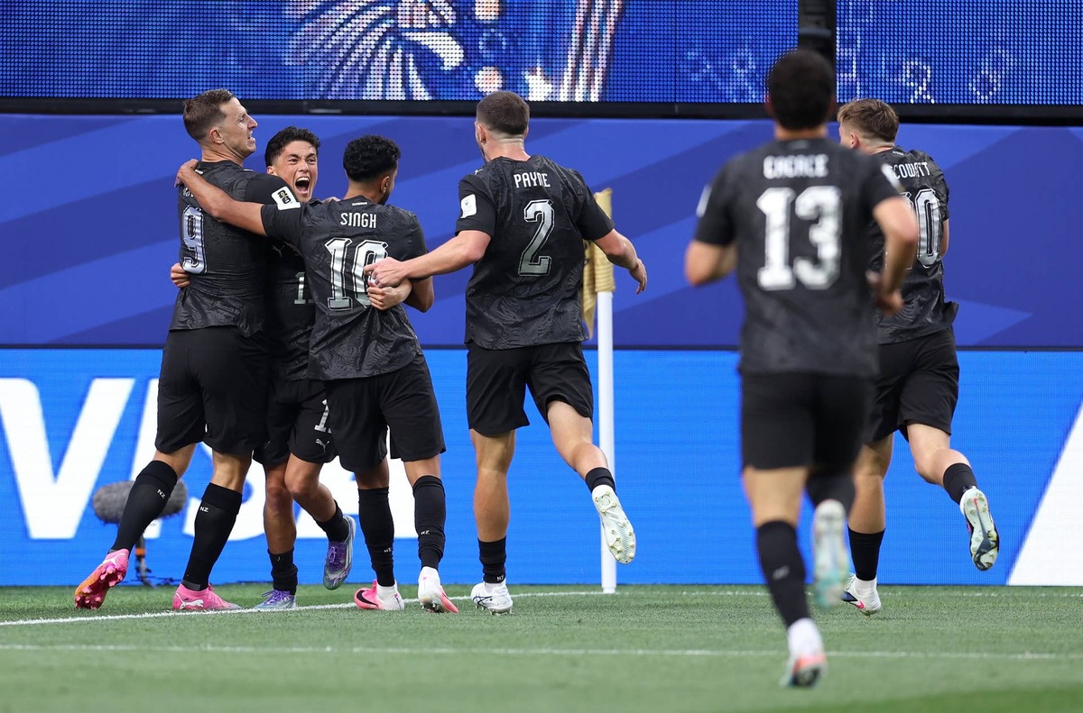  Elijah Just #11 of New Zealand celebrates with teammates after scoring his team's first goal during the FIFA World Cup 2026 Group G match between IR Iran and New Zealand at Los Angeles Stadium on June 15, 2026 in Inglewood, California. (Photo by Alex Livesey - FIFA/FIFA via Getty Images) Photo by Alex Livesey - FIFA/FIFA via Getty Images